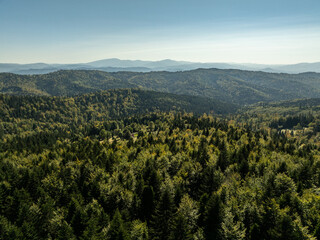 Beskid Maly aerial panorama of potrojna hill and czarny gron.Little Beskids mountain range in summer.Aerial drone view of Rzyki Village in Beskid Maly Poland.Czarny gron ski resort in Rzyki.