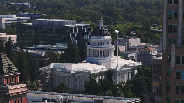 California State Capitol building on a sunny day in Sacramento. The California State Capitol stands as a historic edifice, combining neoclassical architecture with the functions of state government.