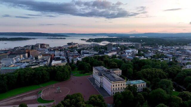 4K aerial video of the Royal Palace (Det kongelige slott) and Statue of King Karl Johan Oslo. In the background the castle park. Oslo, Norway.
