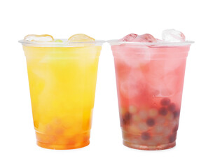 Tasty bubble tea in plastic cups isolated on white