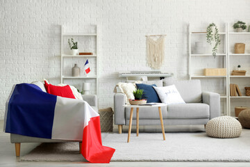 Sofa with flag of France in living room interior
