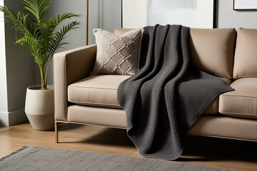 Elegant Charcoal Grey Throw Blanket on Taupe Sofa for Contemporary Home Style
