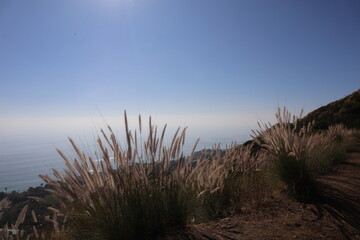 sunset from the mountains on the water west coast