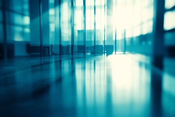 Blurry wideangle shot of futuristic corporate office with transparent walls where minimalist desks fade into the background using depthoffield blur