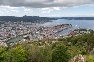 View of the City, Harbor and Mountains surrounding Bergen Norway from Atop Mount Fløyen at the Fløibanen Funicular Station