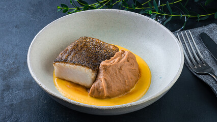 Lunch fried fish with sauce and spices.