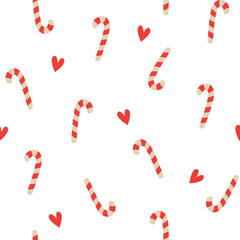 Vector Christmas seamless pattern with holiday candy canes and heart on white background.
