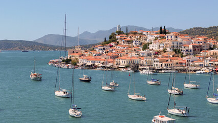 greece peloponnese region poros island houses clock tower and boats aerial view on daylight