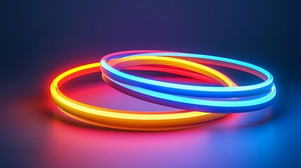 Fototapeta premium Colorful glowing rings intertwined on a dark background.