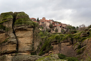 Orthodox monasteries of Meteora (Greece) on the rocks shrouded in fog