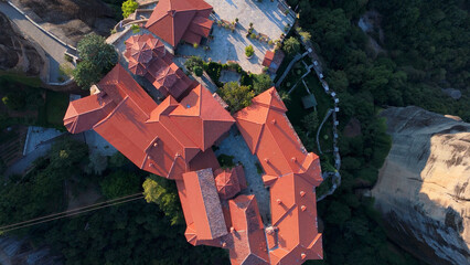 Greece Meteora region unique mountain formations and monasteries taken with drone at sunrise