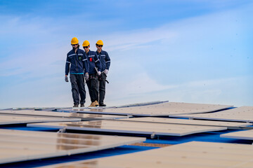 engineer man inspects construction of solar cell panel or photovoltaic cell by electronic device....