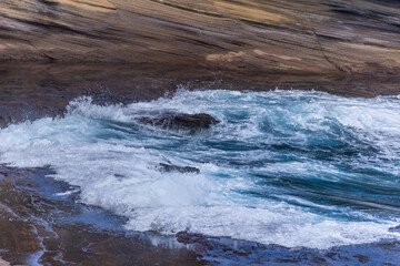Dramatic Ocean crashing wave Hawaii at Makapu Point