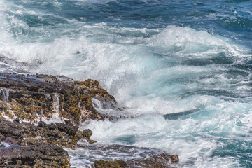 Dramatic Ocean crashing wave Hawaii at Makapu Point