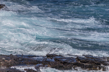 Obraz premium Dramatic Ocean crashing wave Hawaii at Makapu Point