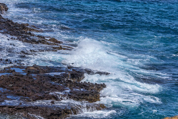 Dramatic Ocean crashing wave Hawaii at Makapu Point
