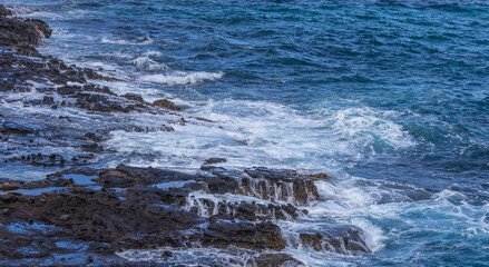Dramatic Ocean crashing wave Hawaii at Makapu Point
