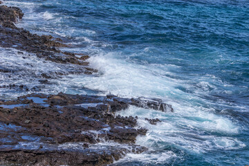 Dramatic Ocean crashing wave Hawaii at Makapu Point