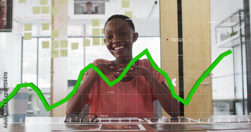 Poster financial data graph image over smiling businessperson in office with sticky notes