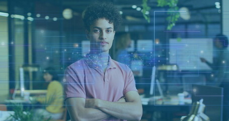 Cross-armed man in office with digital data processing image over him