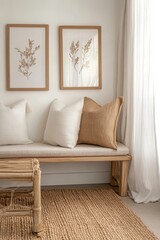 Simple frames of botanical prints in soft tones. Framed in light wood, hanging on a wall in a simple room.