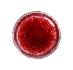 Tasty grape juice in glass isolated on white, top view