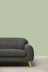 Stylish sofa in living room. Interior design