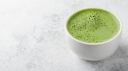 Fresh Matcha Green Tea in White Bowl
