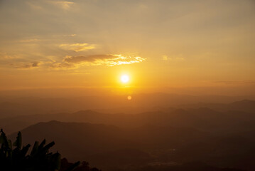 Obraz premium Golden sky sunrise dramatic beautiful landscape view. Dawn sky gold dusk time cloudscape with sunlight. Dramatic sunset scenic landscape. Beautiful landscape sunshine nature