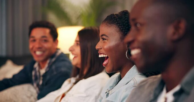 Woman, friends watching tv and laugh in home, streaming and chill to relax in living room. Television, happy group and diverse people with funny movie, comedy show or eating popcorn together for film
