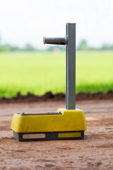 A Nuclear Density Gauge to check for soil density of a soil lift fill on a new road construction...