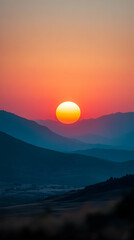 Golden Sun Sets Behind Silhouetted Mountain Ranges at Twilight