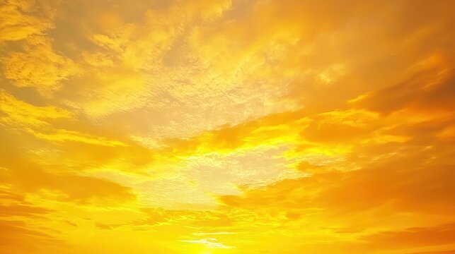 Vibrant yellow sky during a sunset, showcasing the beauty of the end of the day.