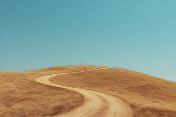 Obraz premium A desert road winds through the vast sandy landscape under a clear blue sky