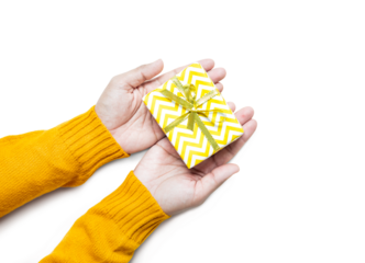 Cheerful festive scene gift with gold glitter,confetti and celebration streamers. Perfect for occasions like birthdays, holidays, and celebrations.concepts of the joy of giving and festivity.