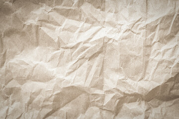 Old paper vintage texture surface for background. Recycle pale brown paper crumpled texture, Cream color recycled kraft paper texture blank with copy space for text.