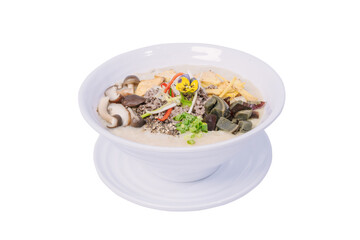  A bowl of congee topped with various ingredients, including minced meat, mushrooms, tofu, century egg, and a flower.