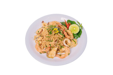 A plate of stir-fried spaghetti with seafood, vegetables, and a flavorful sauce, garnished with a...
