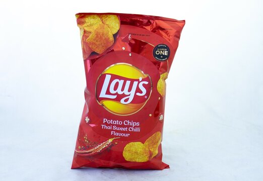 Johannesburg, South Africa - a packet of Lays potato chips isolated on a clear background with copy space