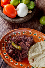 Dish full of moronga or blood sausage, with tortillas, a typical food from Mexico, Central America...