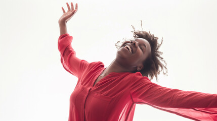 Joyful young woman with flowing hair dancing, isolated on white.