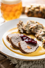 Beef fillets from sirloin steak with traditional Czech sauce, Karlovy Vary dumpling with...