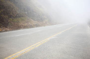 A mountain road in dense fog, Ecuador.