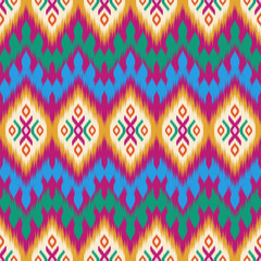 Colorful of Ikat pattern, Thai art design, Ikat Ornament style, Ikat Print. Abstract geometric seamless pattern background traditional ethic for clothing, fabric, textile, fashion.