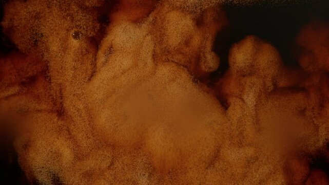 Super Slow Motion Detail Shot of Pouring Fresh Creamy Coffee at 1000fps.