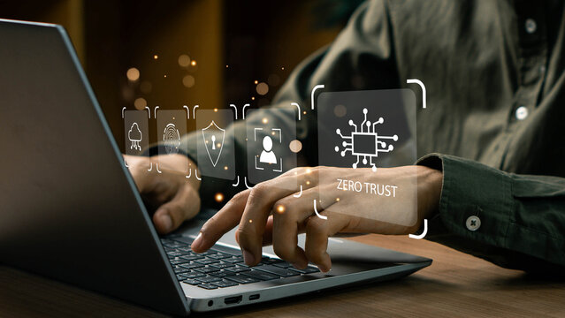 Zero trust security concept, Businessman using laptop with zero trust icons on virtual for business information security network. Ai technology