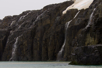 The Alkefjellet cliff in Lomfjordhalvoya in Ny-Friesland at Spitsbergen