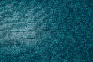 Textured blue fabric with subtle gradient creates an elegant background for design projects
