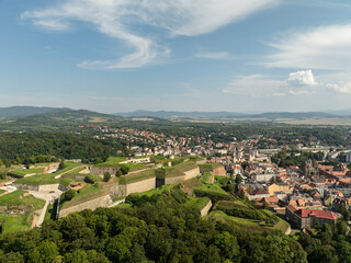 Obraz premium Klodzko Fortress (German: Festung Glatz) – a preserved fortress in Klodzko, a defense system from the 17th and 18th centuries in Poland. Aerial drone view of Klodzko Fortress and town Klodzko..