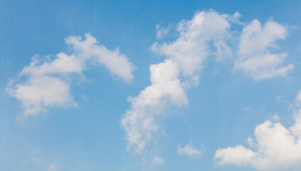 Clouds on the blue sky as a background